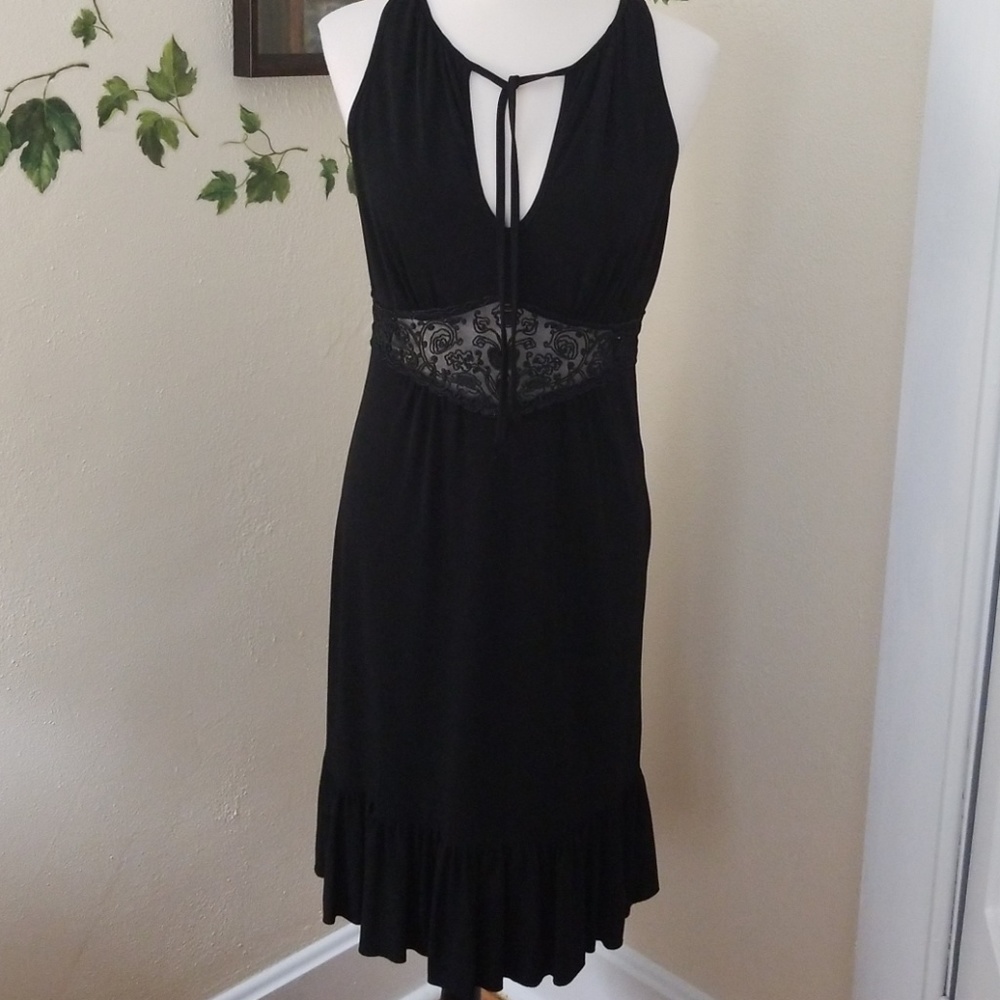 Pretty black dress with lace waist inset